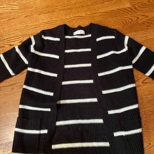 Long sleeve cardigan. Never worn.
